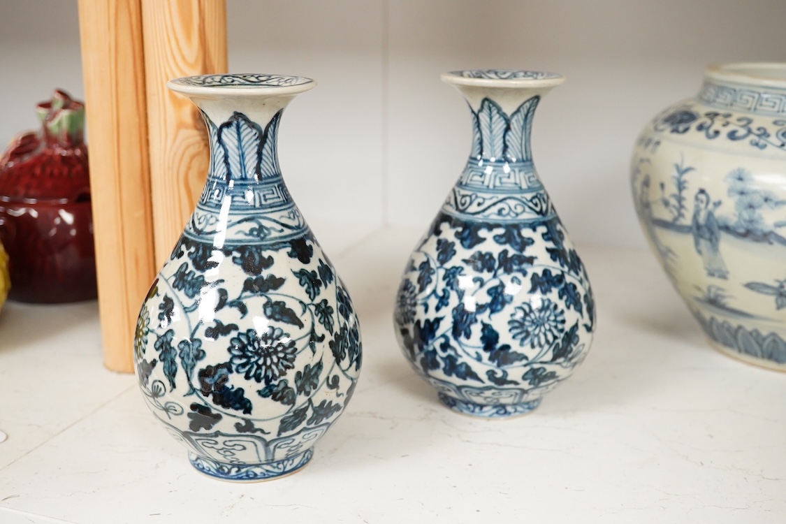 A pair of Chinese blue and white pear shaped vases, a similar jar and a Japanese bowl, largest 23cm in diameter